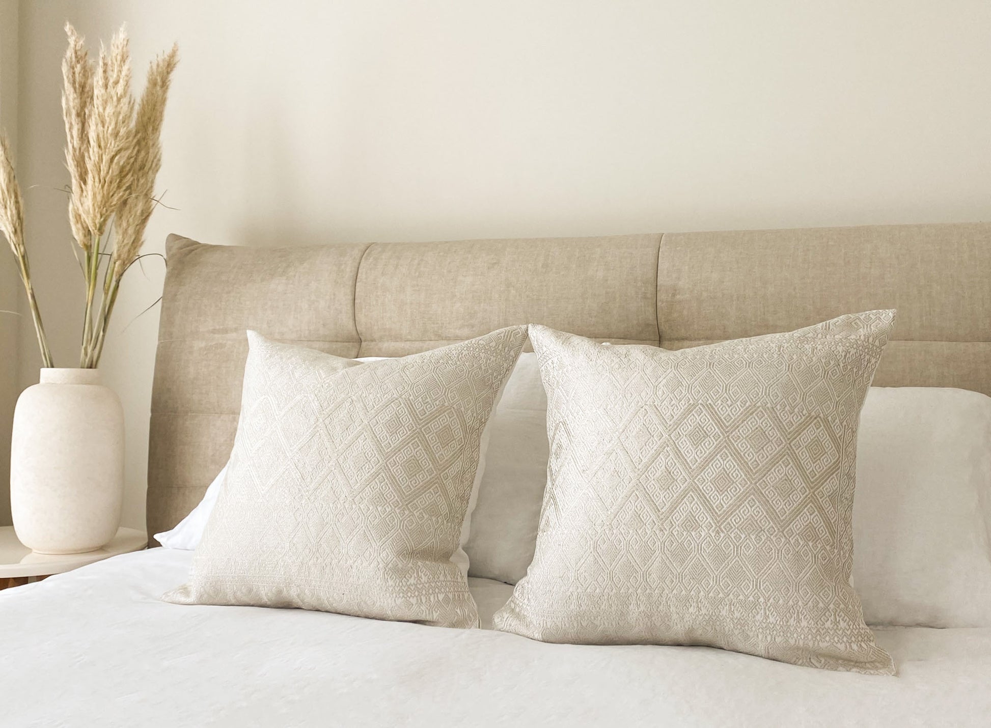 Elegant Silver Metallic Thread Diamond Brocade Chiapas Cushion, enhancing the charm of a well-dressed bed.