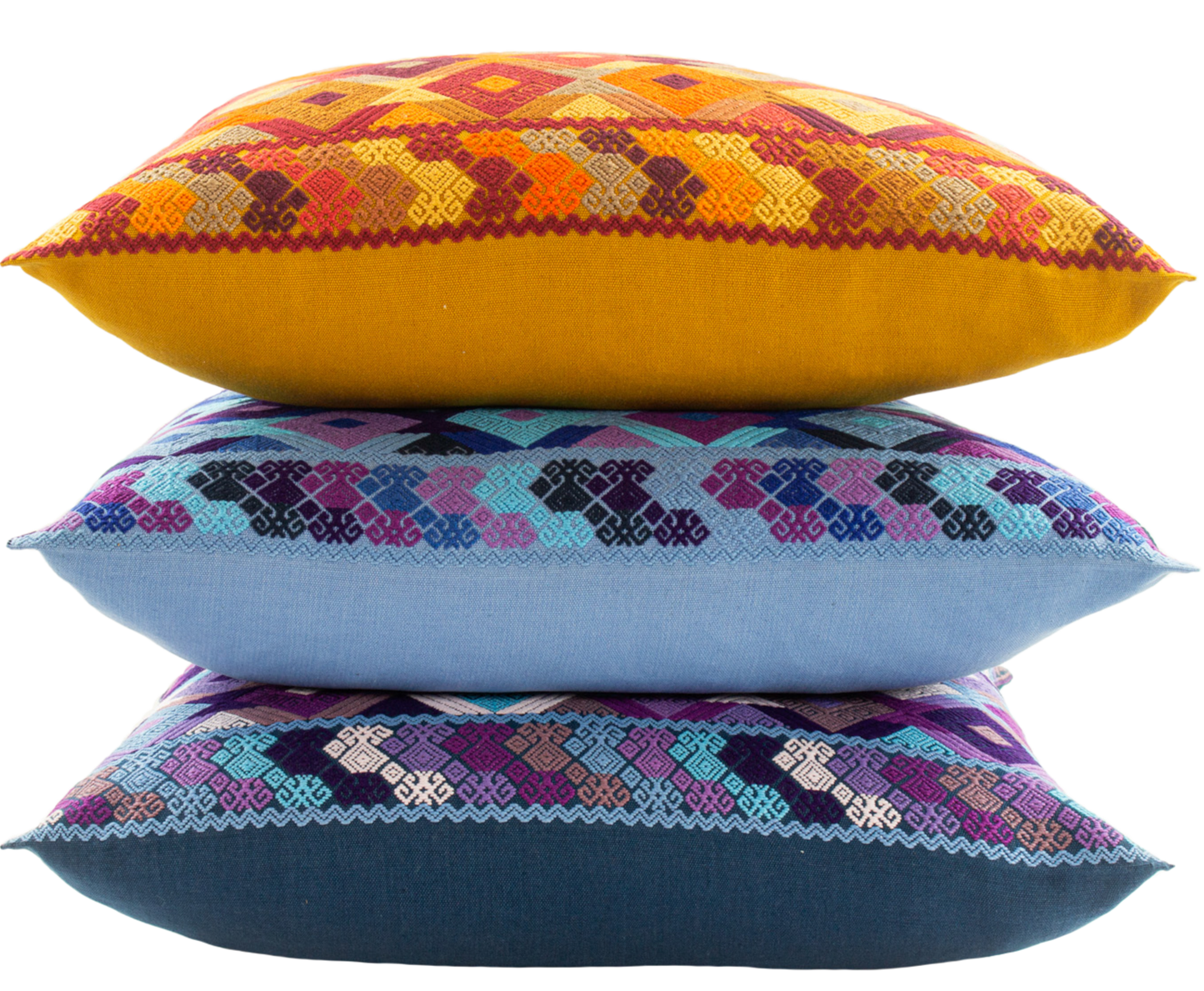 Juanas Chiapas Cushions Collection with intricate diamond shapes in vibrant colors.