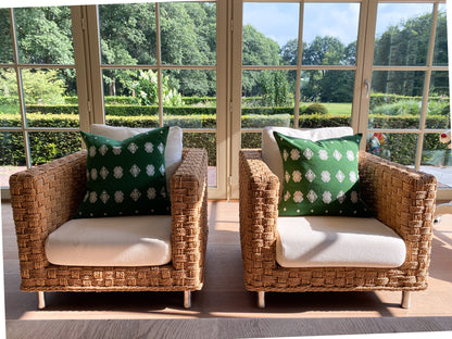 Green cotton cushion with intricate beige brocade designs, elevating living room decor.