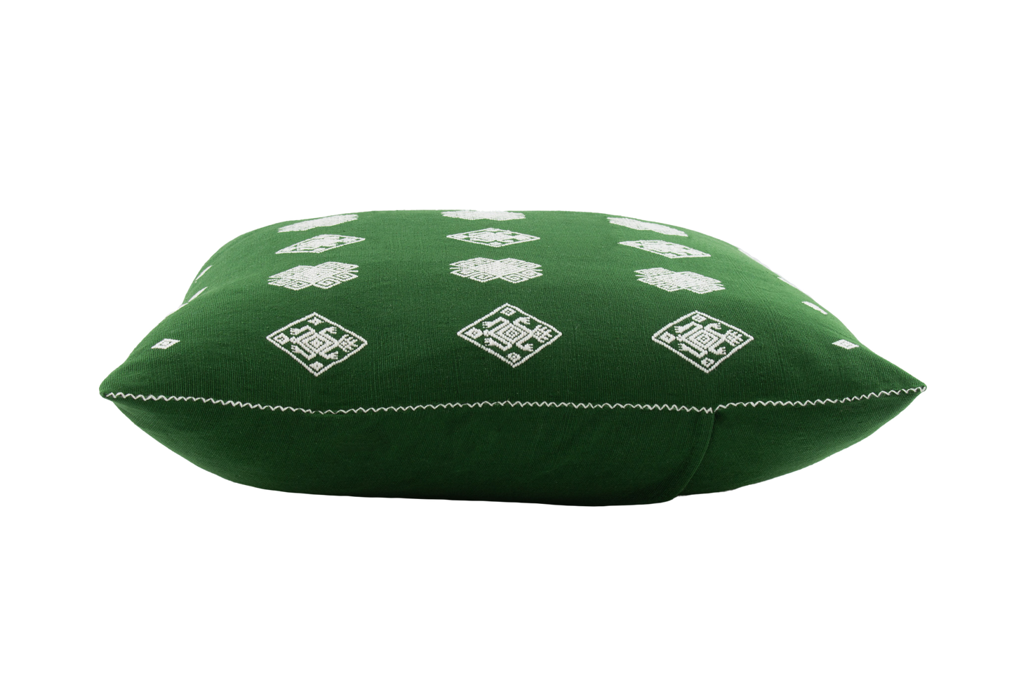 Green cotton cushion with intricate beige brocade designs, showcasing traditional backstrap loom weaving