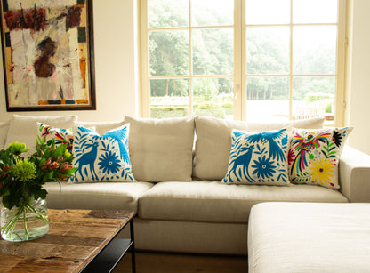 Blue Handcrafted Tenango Otomi Embroidery Cushion with Animal and Flower Designs, elevating living room decor.