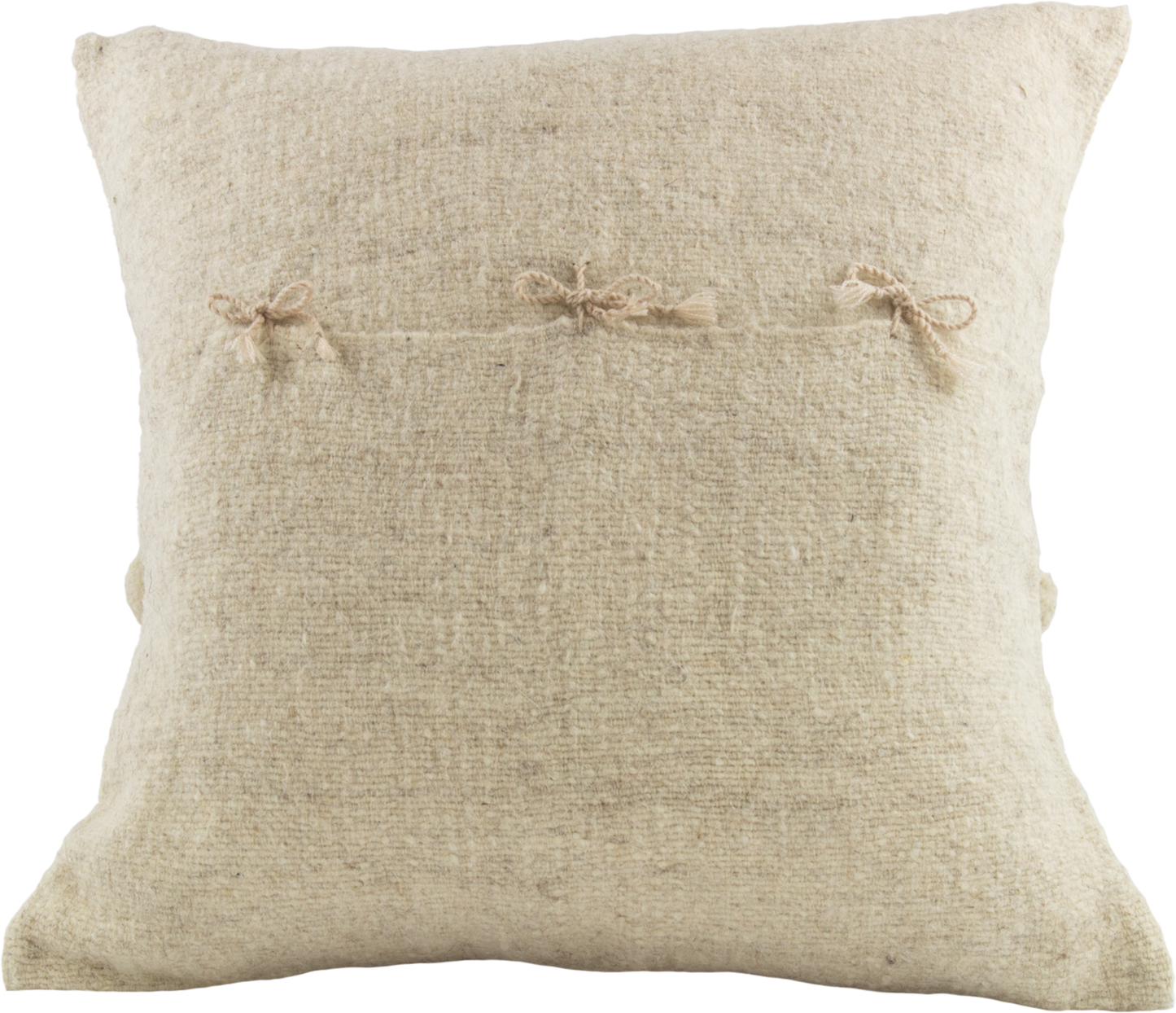 Beige Cushion crafted from 100% wool, adorned with charming beige pom poms and featuring a secure folding back with cute delicate ribbons closure.