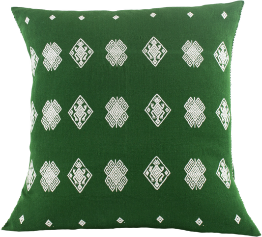 Green cotton cushion with intricate beige brocade designs, showcasing traditional backstrap loom weaving.